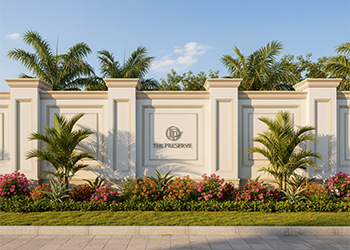 Secure compound wall surrounding residential plots for sale in Pudupakkam.